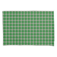 Geometrische grüne Tupfen auf irgendeiner Farbe
