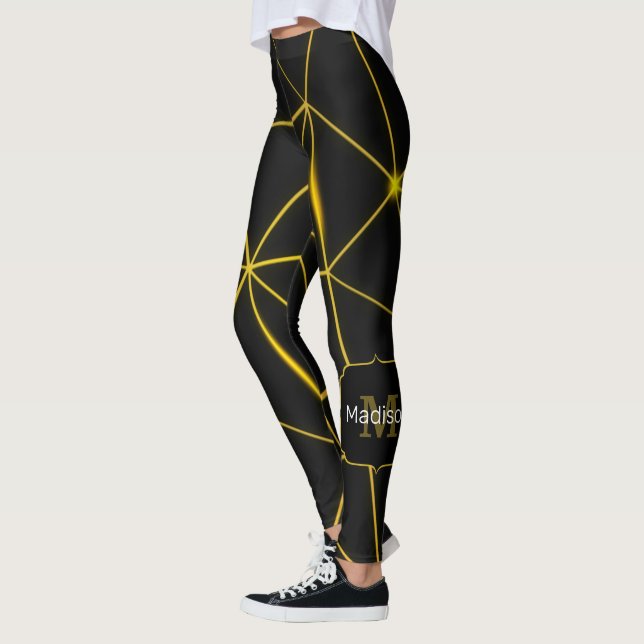 Geometrische schwarze Dreiecke Goldlinien Monogram Leggings (Links)