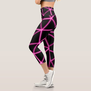 Geometrische schwarze Dreiecke neonrosa Linien rüc Capri Leggings