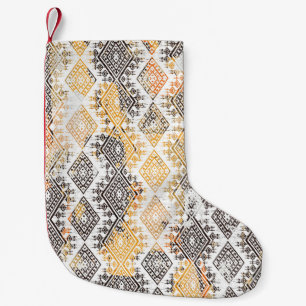 Geometrisches Boho-Stamm: Störendes Muster. Kleiner Weihnachtsstrumpf