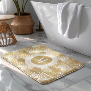 Geometrisches Deko-Muster aus Weiß und Gold Badematte