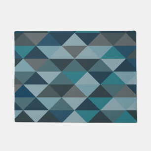 Geometrisches Dreieck-Muster in Blauem und in Fußmatte