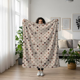 Geometrisches Muster von braunen und rosa Polka Pu Sherpadecke