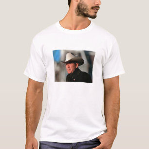 George W. Bush - gekleidet im Schwarzen, das einen T-Shirt