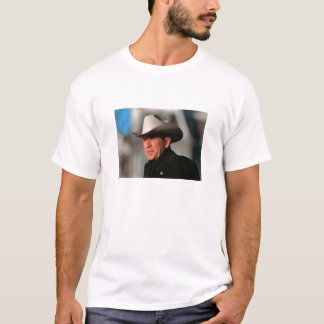 George W. Bush - gekleidet im Schwarzen, das einen T-Shirt