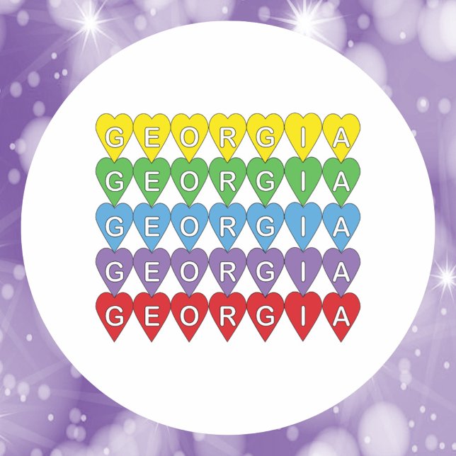 Georgia Regenbogen-Herzen-Muster Runder Aufkleber (A sticker that says Georgia in yellow, green, blue, red and purple hearts.)