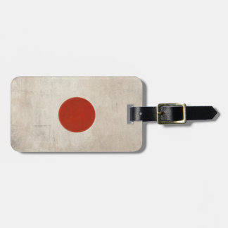 Gepäck-Umbau mit schmutziger Vintager Flagge von Gepäckanhänger