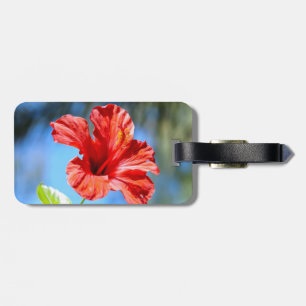 Gepäckanhänger mit rotem Hibiskus
