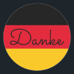 German Flag Colors Danke Runder Aufkleber<br><div class="desc">Danke an Danke an die deutsche Sprache, Danke für Ihre Nachricht in den Farben der deutschen Flagge. Sie können den modernen monoline-whimsikkalkalligraphischen Stil ändern, um Ihre eigene Textnachricht zu erstellen. Probieren Sie einen anderen Schriftart Stil, Größe und Farbe und personalisieren Sie das Textdesign, um Ihre eigenen typografischen Aufkleber zu machen....</div>