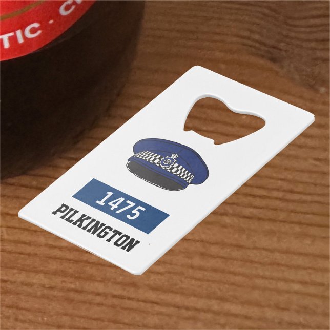 Geschenk eines Polizeibeamten. UK Police Flat Cap Geldbeutel Flaschenöffner (Von Creator hochgeladen)