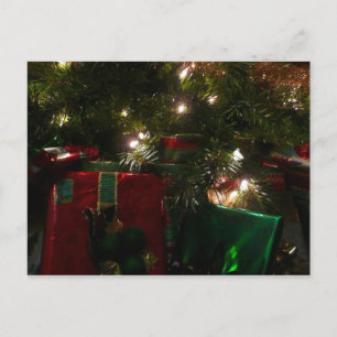 Geschenke unter dem Baum Weihnachtsfeiertag Feiertagspostkarte