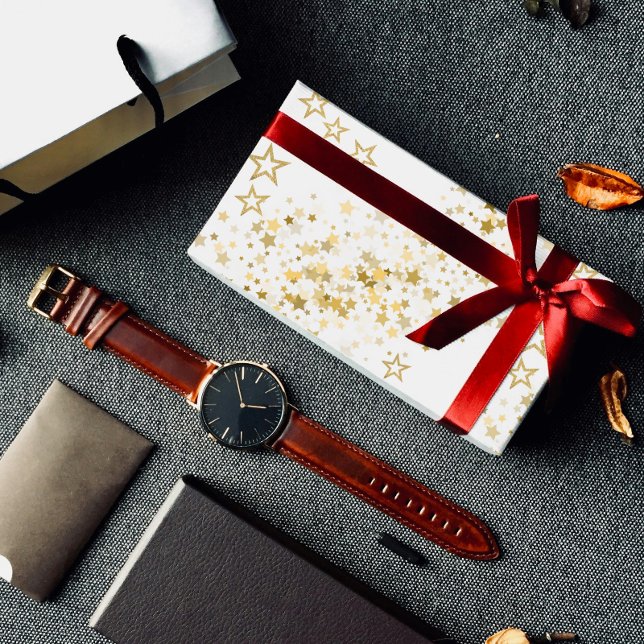 Geschenkpapier mit goldenen Sternen (Von Creator hochgeladen)