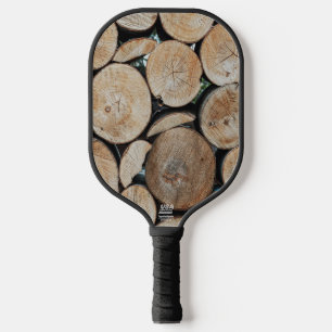 Geschichtete Baumstammholzscheite Fotografie Pickleball Schläger
