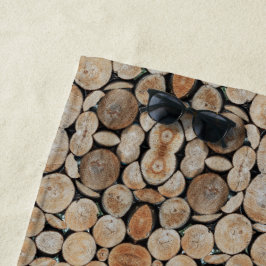 Geschichtete Baumstammholzscheite Fotografie Strandtuch