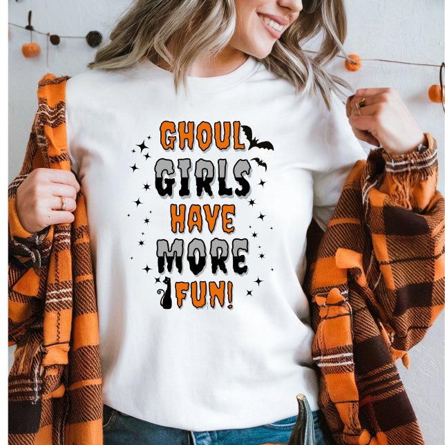 Ghoul Girls haben mehr Spaß an modernen Halloween Sweatshirt (Women in a Ghoul Girls Have More Fun Halloween sweater and an orange plaid top. )