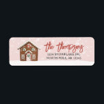 Gingerbrei Christmas Return Labels<br><div class="desc">Dieses Adressetikett zeigt ein festliches Aquarellhaus,  das mit roten und grünen Pfefferminzen und weißer Vereisung geschmückt ist. Der Hintergrund ist pink mit Aquarellschnee. Die Typografie ist ein roter Script-Schriftart für den Familiennamen und ein Vintager Schriftart für die Adresse.</div>