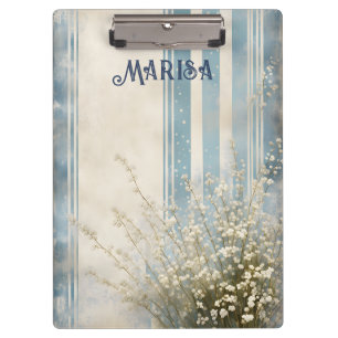 Gipskraut auf verblassten blauen Streifen Klemmbrett