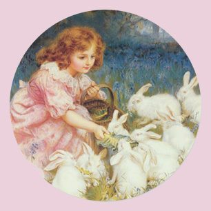 Girl feeding Rabbits Runder Aufkleber