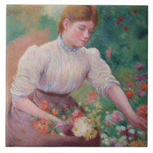 Girl Picking Blume im Sommergarten