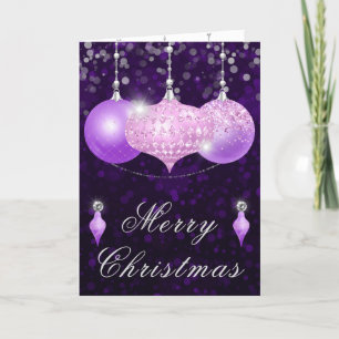 Glänzende rosa und violette Weihnachtskugeln Feiertagskarte