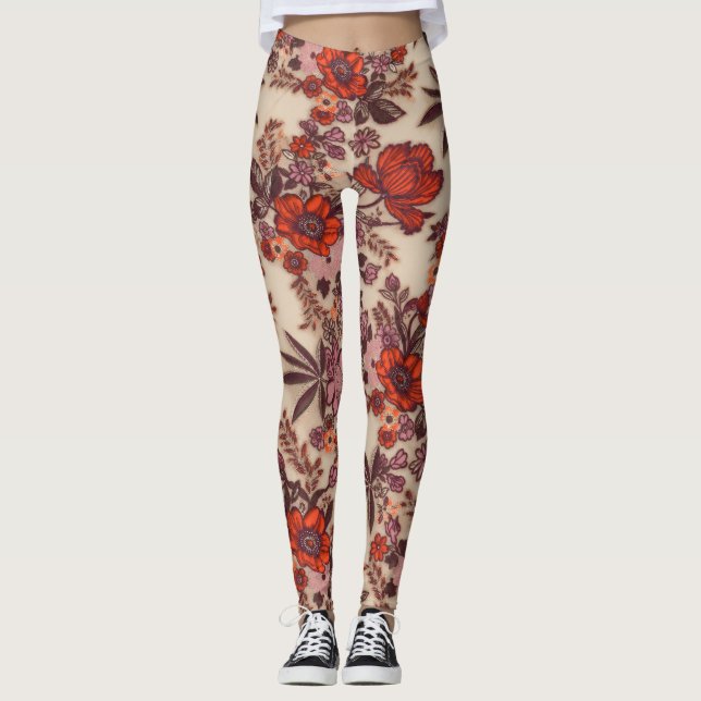 Glänzendes orangefarbenes Blumenstickereimuster au Leggings (Vorderseite)