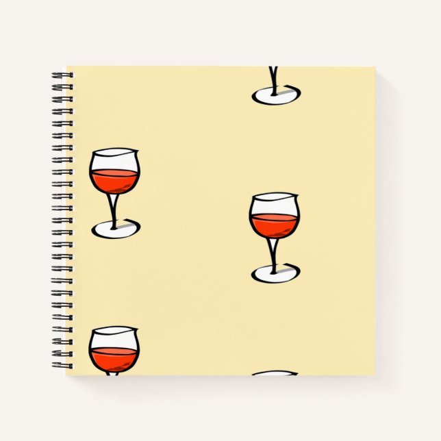 Glas Wein auf Orange Notizbuch (Vorderseite)