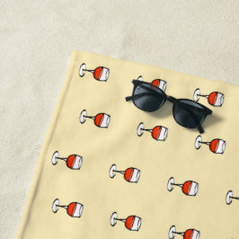 Glas Wein auf Orange Strandtuch