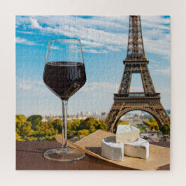 Glas Wein mit Brikenkäse auf dem Eiffelturm Puzzle