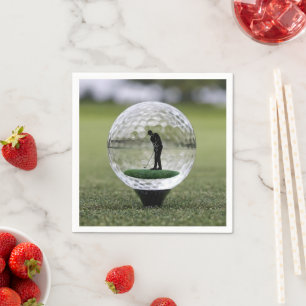 Glasgolfball mit Golfspieler darin, Serviette