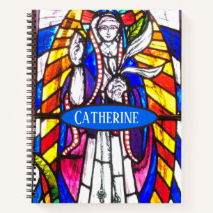Glasmalerei-Design mit religiöser Figur. Notizbuch