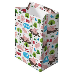 Glückliche Ferkel in der schlammigen, mittelgroßen Mittlere Geschenktüte