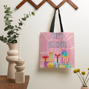 Glückliche Geburtstagsgeschenke auf rosa Tote Tasc