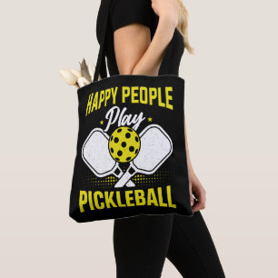 Glückliche Leute spielen Pickleball