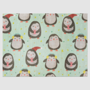 Glückliche Pinguine mit Weihnachtsmannmützen und O Seidenpapier
