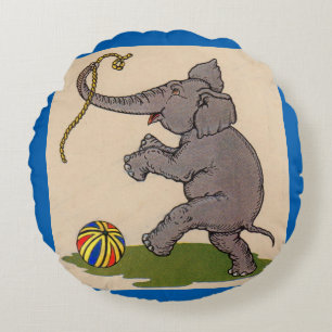 glücklicher Elefant, der mit Seil und Ball spielt Rundes Kissen