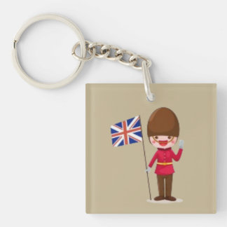 Glücklicher Londoner Gardist winkt mit Union Jack Schlüsselanhänger