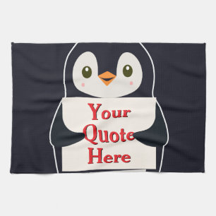 Glücklicher Pinguin, der ein Schild hält, um es zu Geschirrtuch