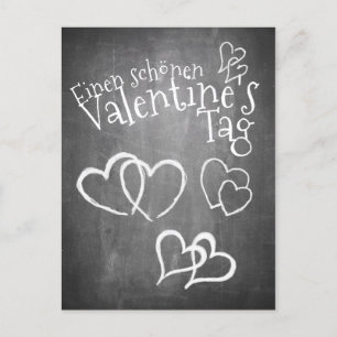 Glücklicher Valentinstag auf einer Kreidetafel Feiertagspostkarte