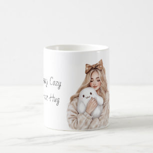 Glückliches gemütliches Gespenst umarmt blonde Mäd Kaffeetasse
