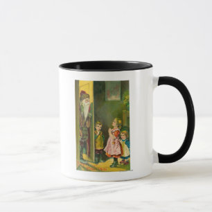 Glückliches Weihnachtskinder, die herein Sankt Tasse