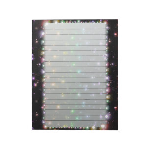 Glühende glänzende Regenbogen-Sterne im Raum Notizblock