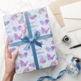 Glühende Schmetterlinge auf dem Abstrakten blauen  Geschenkpapier
