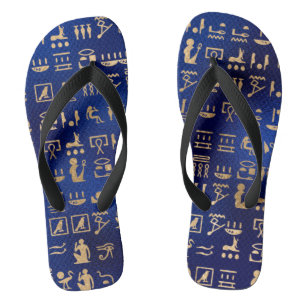 Gold antike ägyptische Hieroglyphen auf Blue Flip Flops