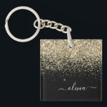 Gold Black Glitzer Script Monogram Girlaname Schlüsselanhänger<br><div class="desc">Schwarze und goldene Imitate Foil Sparkle Glitzer Script Monogram Name Schlüsselanhänger. Das macht den perfekten 16 Geburtstag,  Hochzeit,  Brautparty,  Jubiläum,  Babydusche oder Junggeselinnen-Abschied Geschenk für jemanden,  der Lieben glamourösen Luxus und schicke Stile.</div>