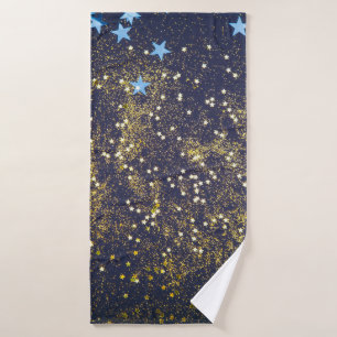 Gold Glitzer und glitzernde blaue Sterne auf schwa Badehandtuch