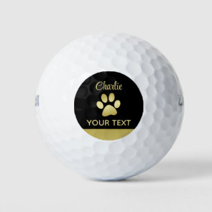 Gold Shiny Dog Paw auf schwarzem Hintergrund Golfball