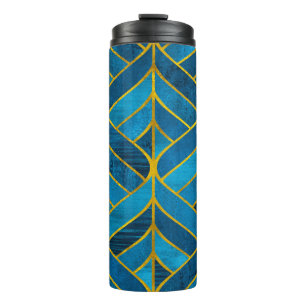 Gold und blaues Muster auf Grunge Hintergrund, nah Thermosbecher