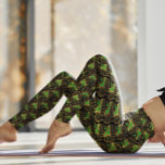 Gold und grüne Art-Deco-Muster auf schwarz Leggings<br><div class="desc">Gold und grünes Art Deco Muster auf schwarzem Hintergrund.</div>