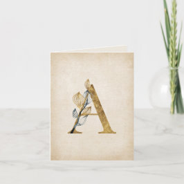 Gold und Schwarz als Monogramm mit Blätter