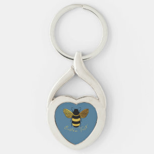 GOLD UND SCHWARZE BUMBLE BEFINDEN SICH AUF BLAU MI SCHLÜSSELANHÄNGER